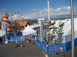 The Weymouth Bayside Festival is open for visitors featuring carnival rides and an observation tower on Sunday, July 29, 2012.