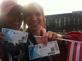 Cronkite students Lisa Blanco and Cailyn Bradley holding their tickets to the Women's Gold Medal Match at Wembley Stadium.