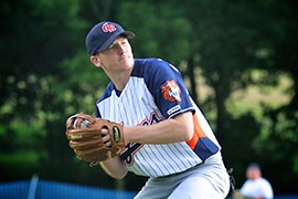 Luke Foley plays thrid base on Friday, August 3, 2012. Players like Foley are able to continue playing baseball because of organizations like Baseball Softball UK.