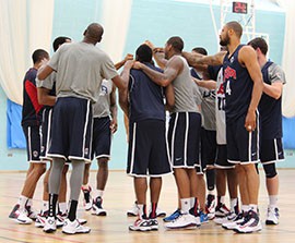 The USA men's basketball team huddles up before practice begins. The team will take on Australia in their sixth game Wednesday afternoon.