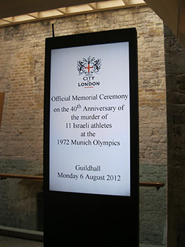 A sign depicts the start of the official Munich Memorial Ceremony in honor of the 11 Israeli athletes and coaches killed 40 years before on Monday, August 6, 2012.