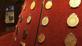 Olympic medals from 1960 to 2008 are displayed in the center of Royal Opera House as part of the Olympic Journey Story of the Games Exhibition.