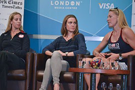 Olympic rower Esther Lofgren (right) talks about her experiences at her first Olympics, as Natalie Coughlin (center) and  Mariel Zagunis (left) look on. The athletes were part of a press conference highlighting the role of women in sports.